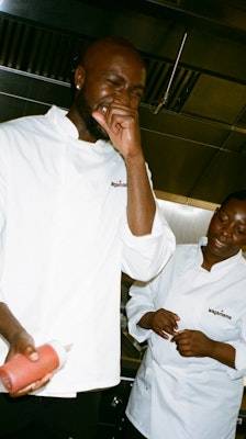 two chefs laughing together